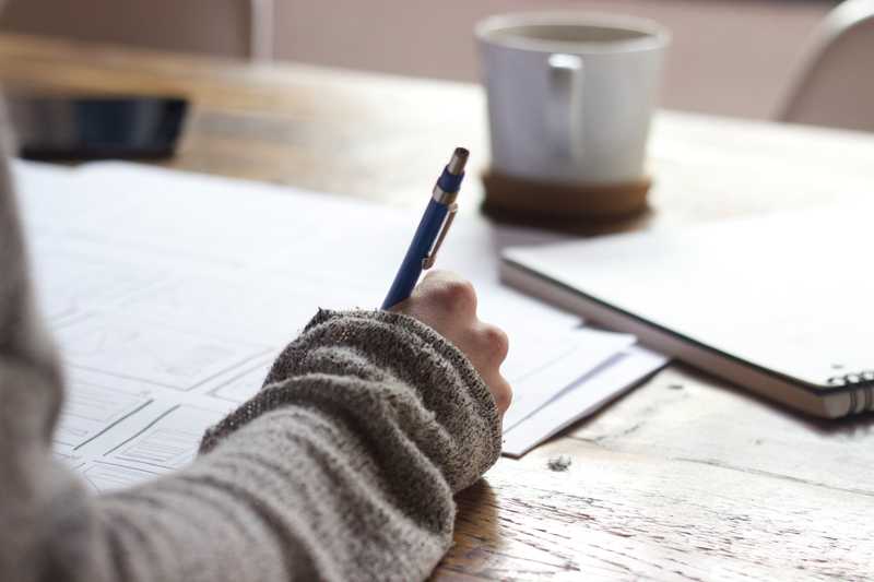 Person studying with coffee