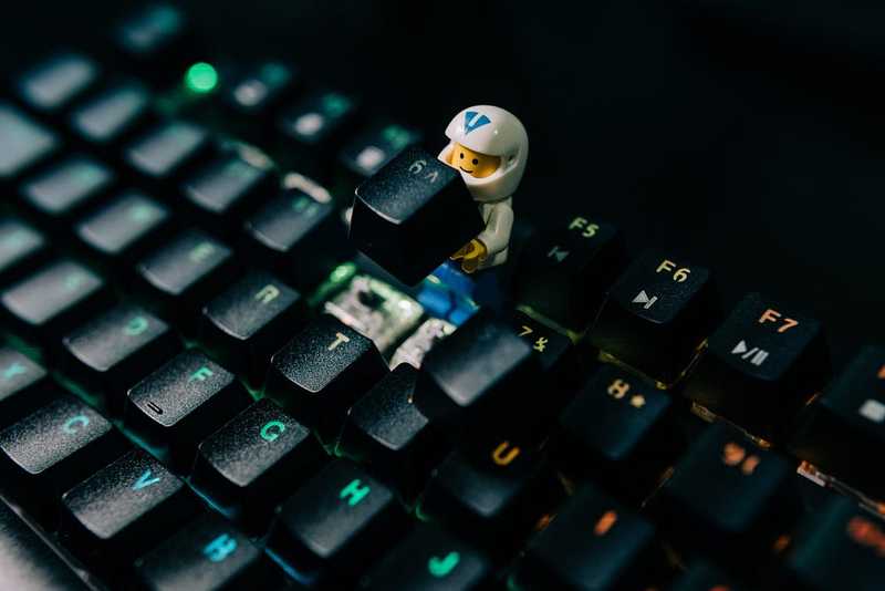 LEGO guy building a keyboard